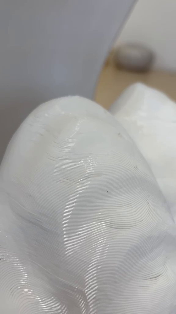Close-up detail of the layers of a large-format 3D print